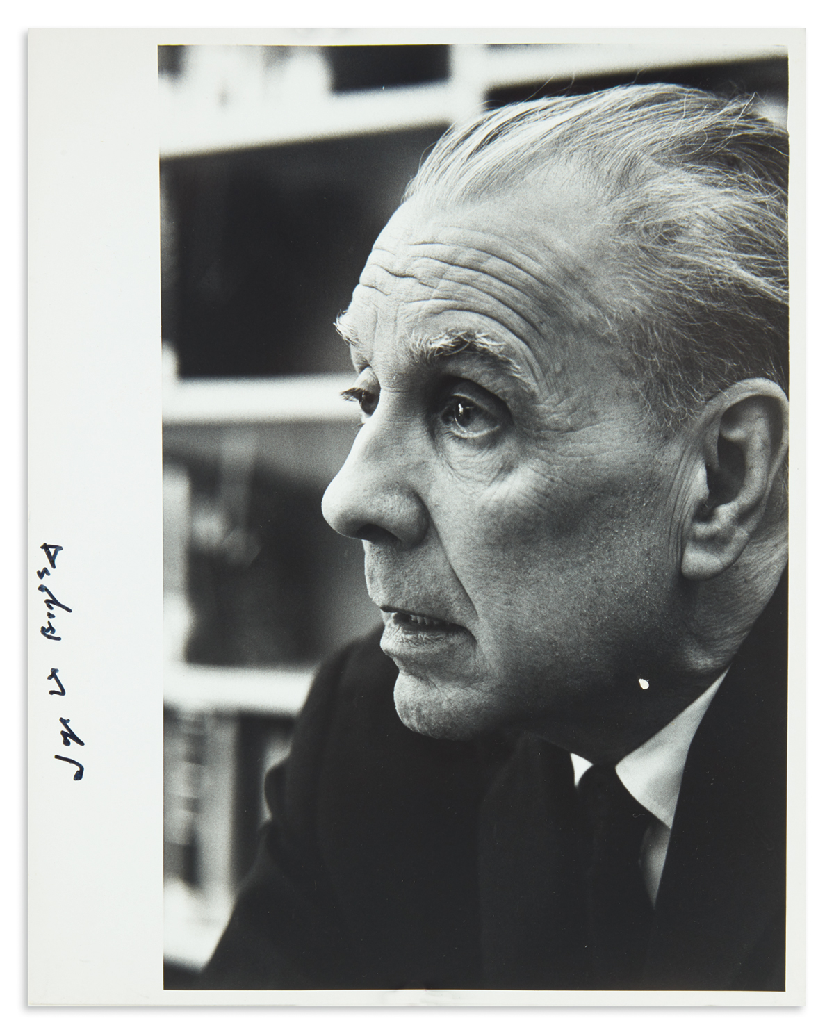 BORGES, JORGE LUIS. Photograph Signed, bust portrait by Charles Phillips, showing him in profile.